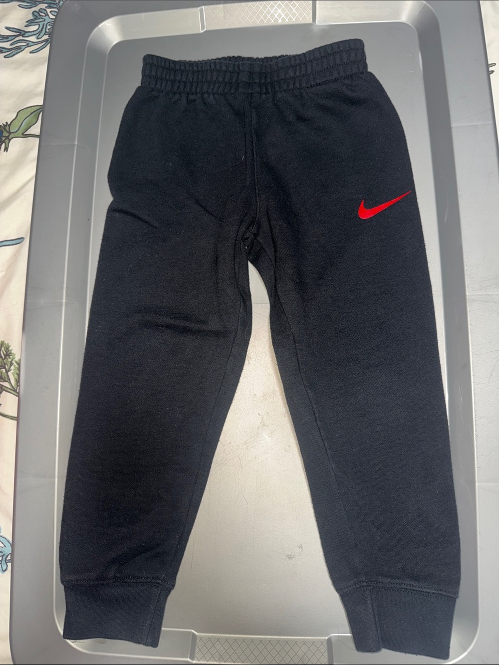 Nike Black Kids Sweatpants with Red Swoosh